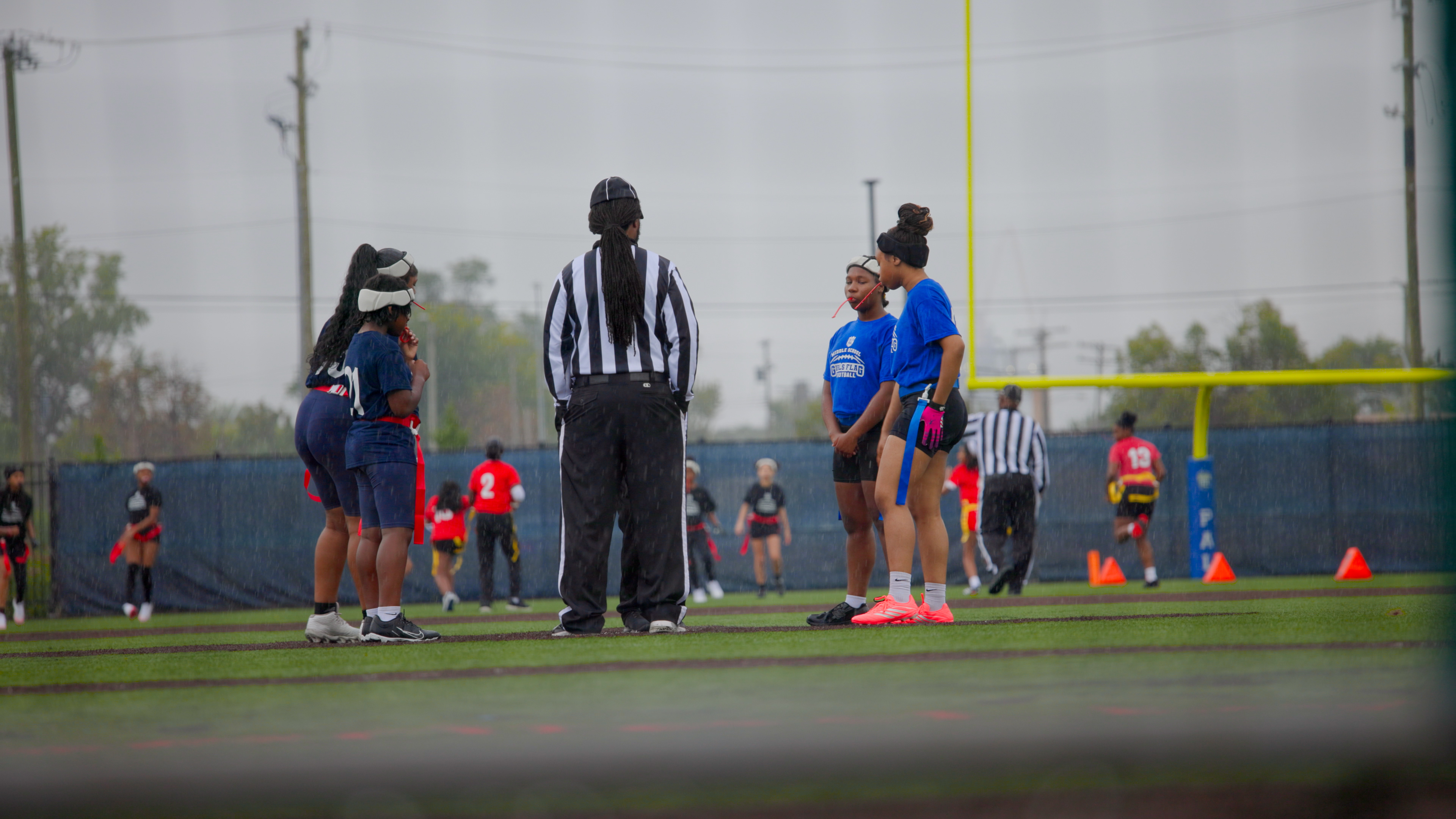 Captains from each team toss coin with referee deciding who gets the ball first. 